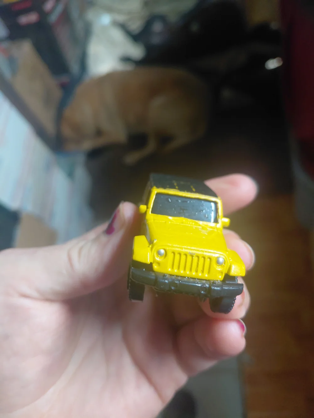 yellow 2015 Jeep Wrangler Unlimited toy car is a 1/64 scale diecast model produc